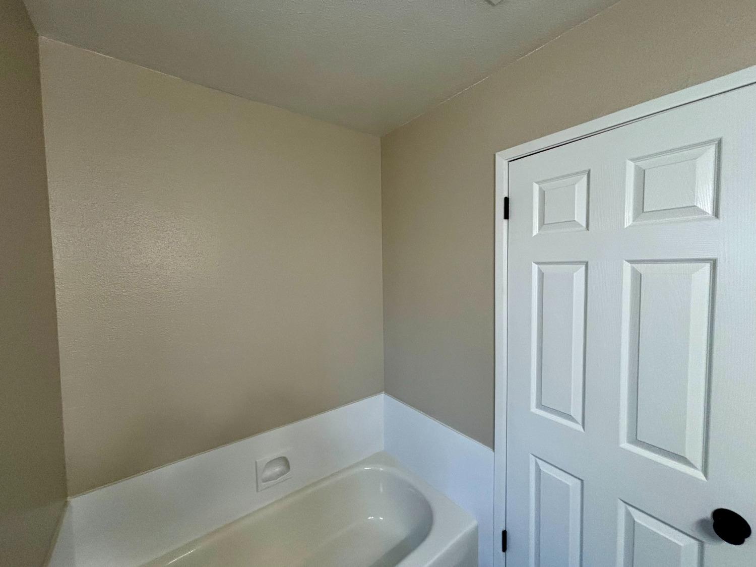 910 Cedar Lane Lemoore, CA 93245 - Photo 29 of 32 a bathroom with a sink