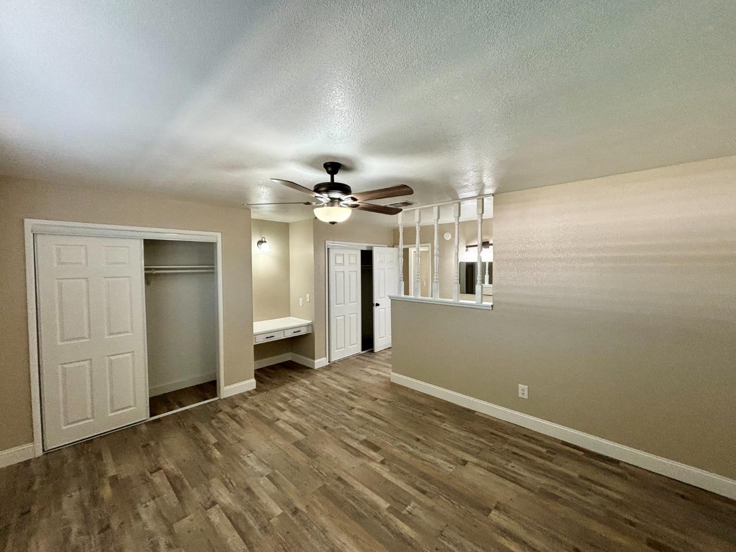 910 Cedar Lane Lemoore, CA 93245 - Photo 30 of 32 an empty room with a bathroom