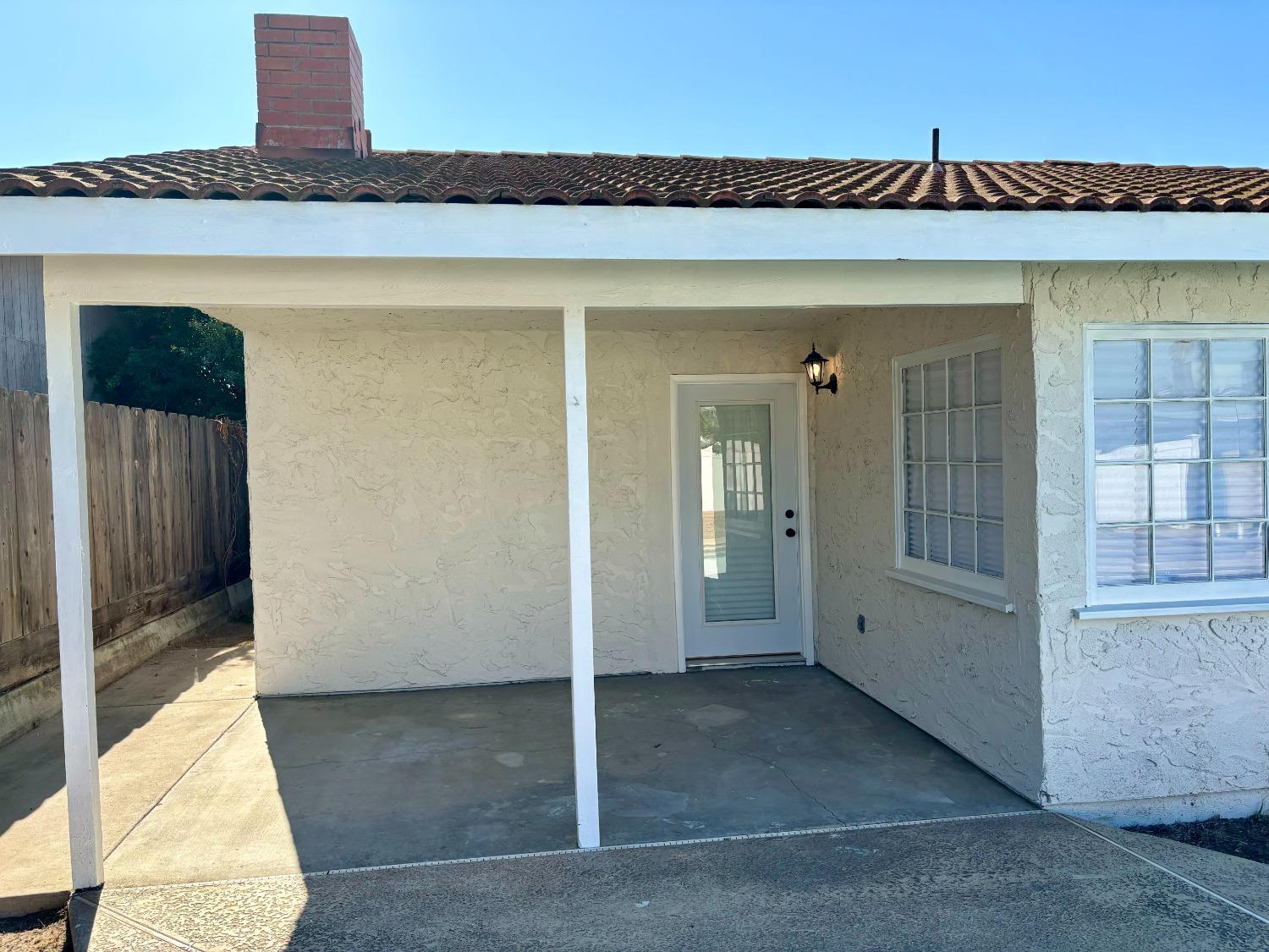 910 Cedar Lane Lemoore, CA 93245 - Photo 10 of 32 a view of a entrance door of the house