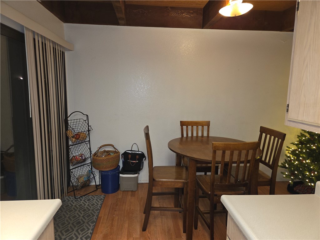 633 North Street Corning, CA 96021 - Photo 13 of 26 a view of a dining room with furniture and wooden floor
