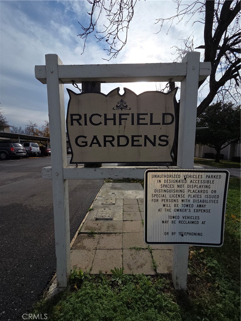 633 North Street Corning, CA 96021 - Photo 3 of 26 a sign on the side of a building