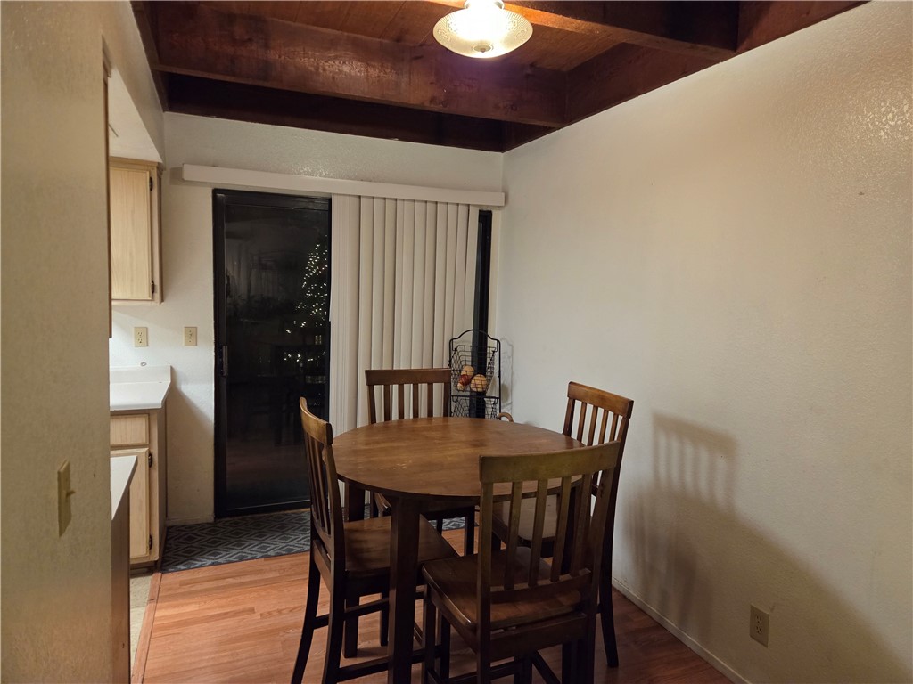 633 North Street Corning, CA 96021 - Photo 9 of 26 a view of a dining room with furniture and wooden floor