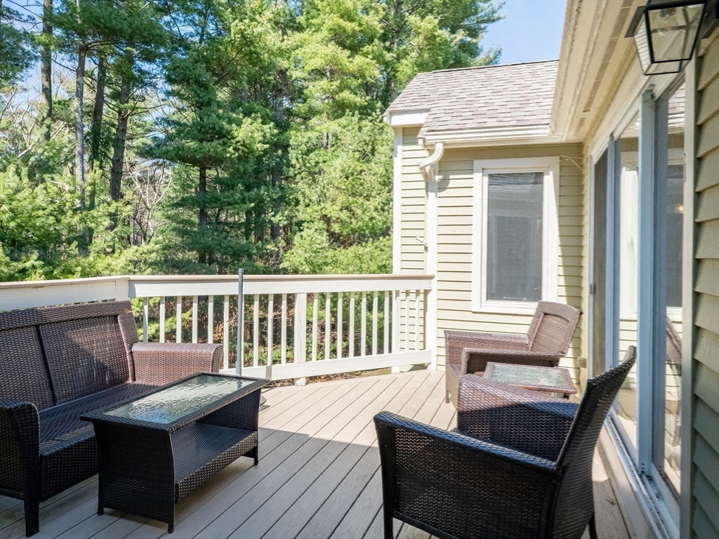 67 Tussock Brook Road, Unit 67 Duxbury, MA 02332 - Photo 34 of 39 a view of a two chairs on the roof deck