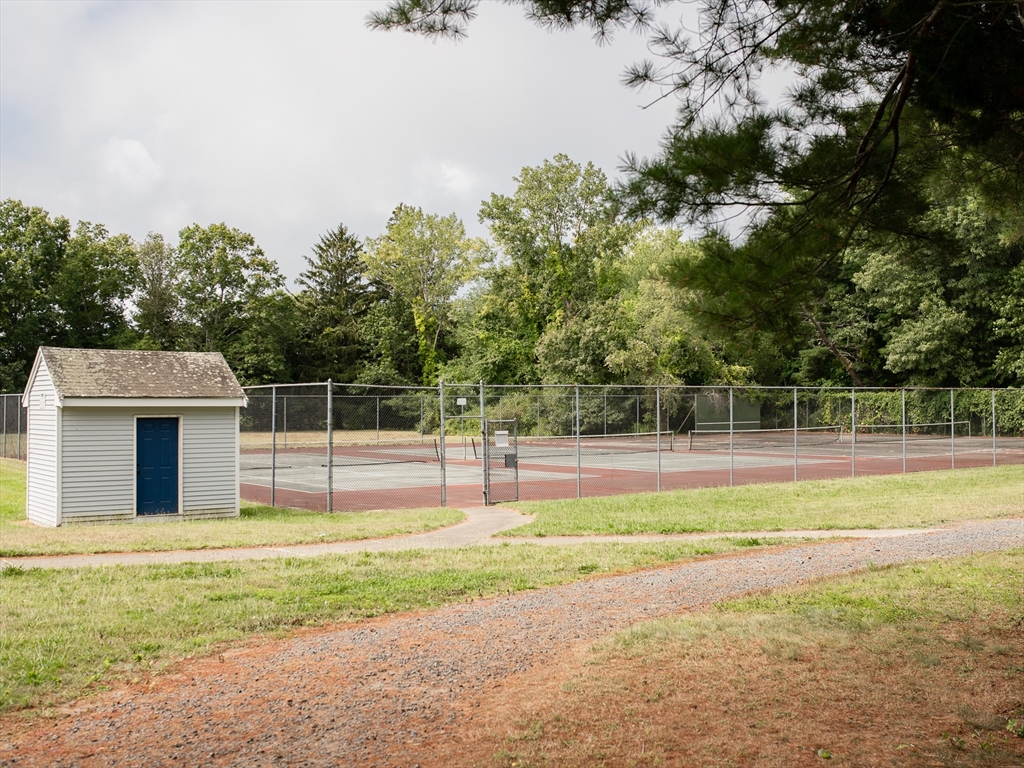 67 Tussock Brook Road, Unit 67 Duxbury, MA 02332 - Photo 39 of 39 a view of swimming pool with a yard