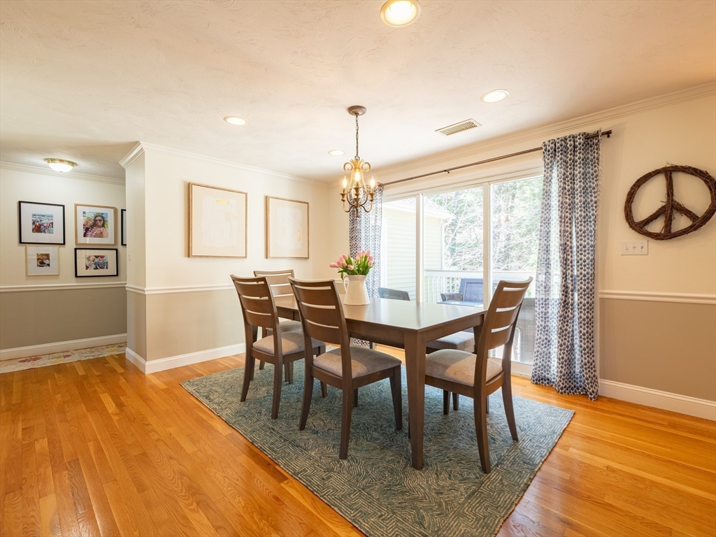 67 Tussock Brook Road, Unit 67 Duxbury, MA 02332 - Photo 8 of 39 a dining room with furniture and window