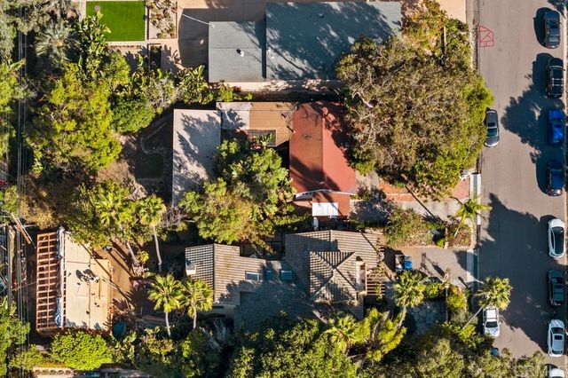 an aerial view of a houses with outdoor space