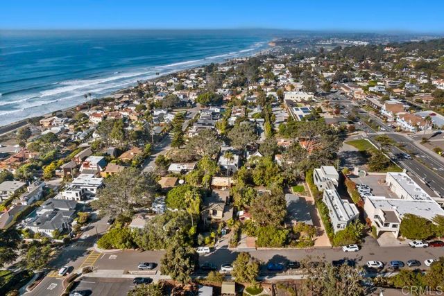 a view of a patio with a tree