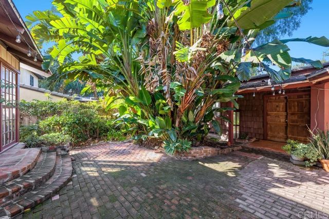 a backyard of a house with lots of green space