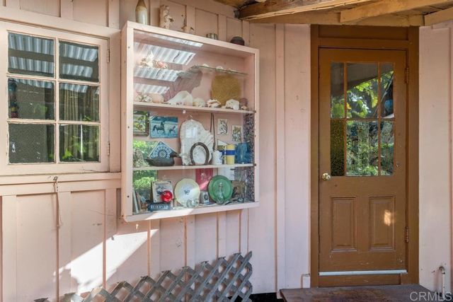 an aerial view of a house with a yard and garden