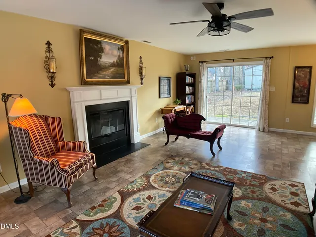 a picture of a bench in front of a window