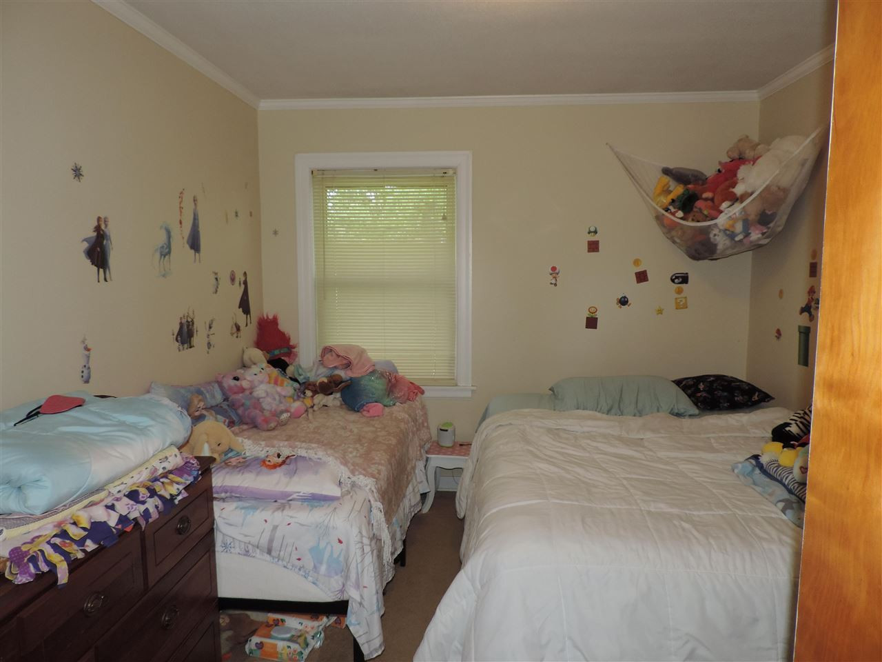 150 Tatum Street Ridgely, TN 38080 - Photo 12 of 17 a bedroom with a bed and a dresser
