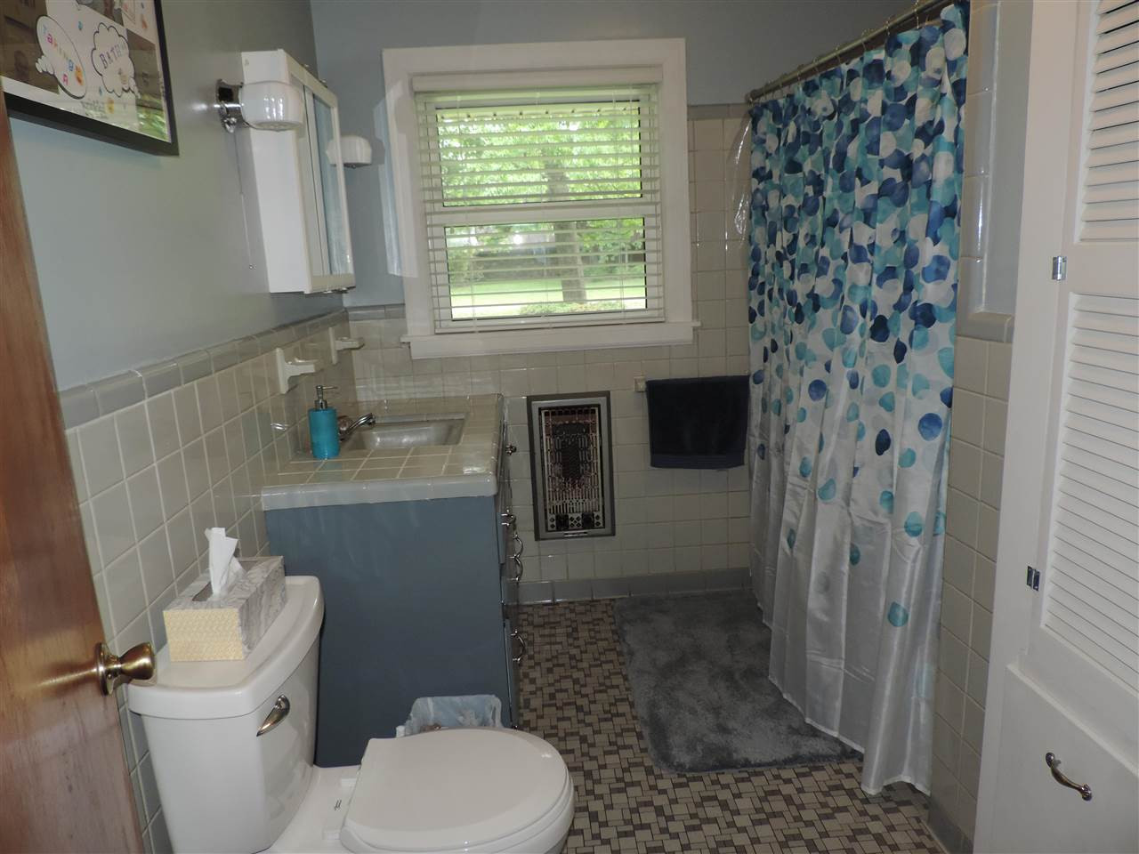 150 Tatum Street Ridgely, TN 38080 - Photo 13 of 17 a bathroom with a toilet and a shower