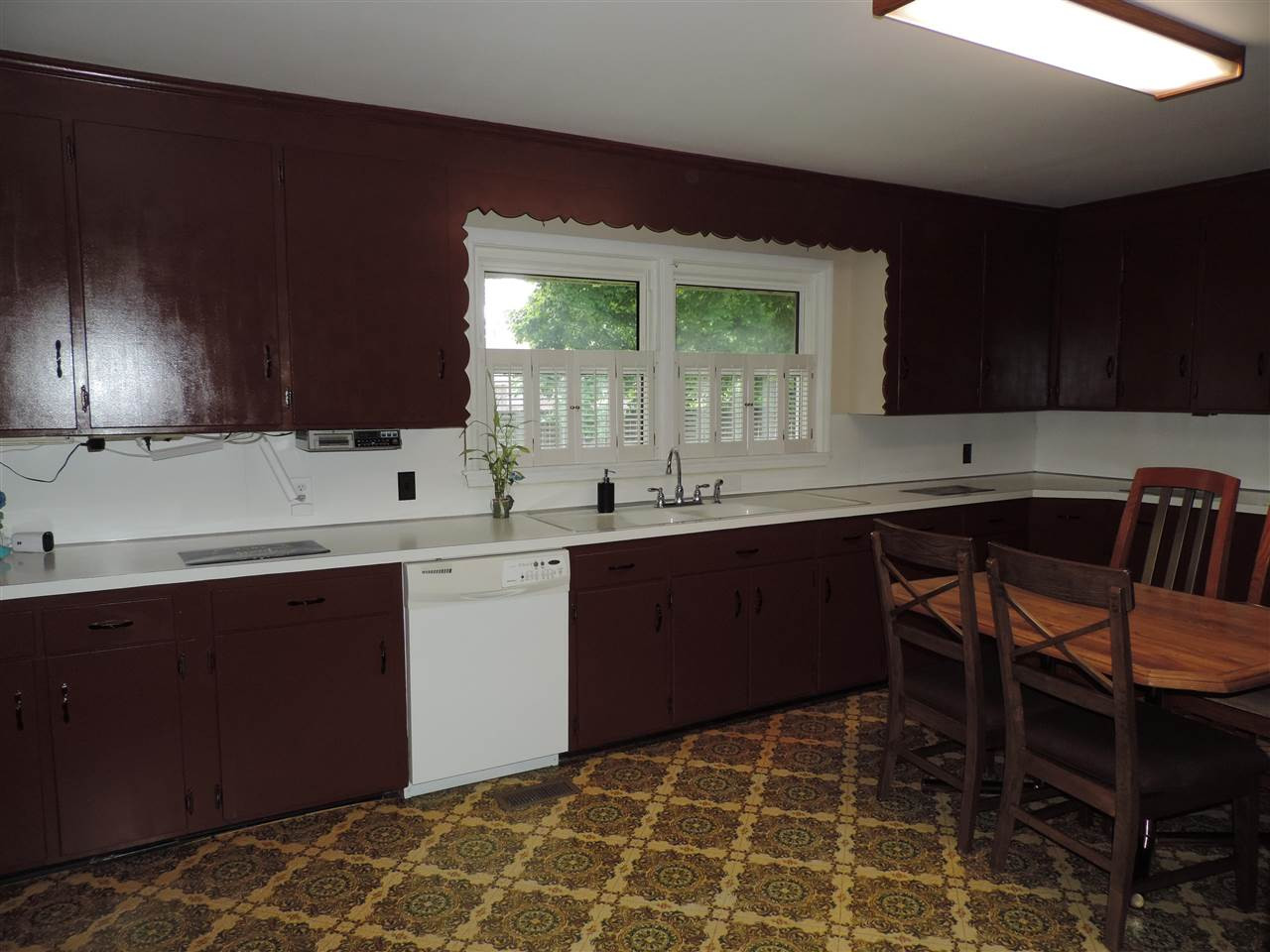150 Tatum Street Ridgely, TN 38080 - Photo 4 of 17 a kitchen with a sink cabinets and window