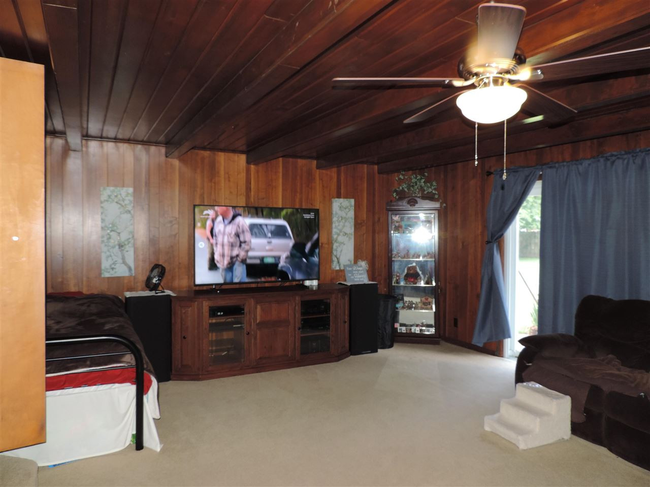 150 Tatum Street Ridgely, TN 38080 - Photo 6 of 17 a bed room with furniture and a chandelier