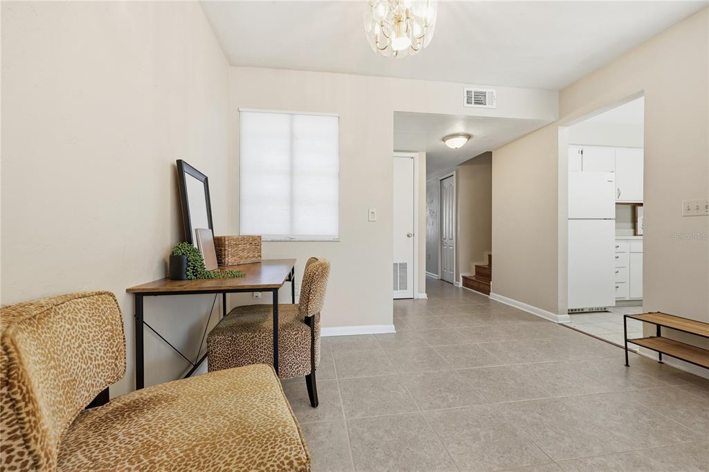 4427 Southwest 21st Lane Gainesville, FL 32607 - Photo 6 of 36 a view of a livingroom with furniture and a window