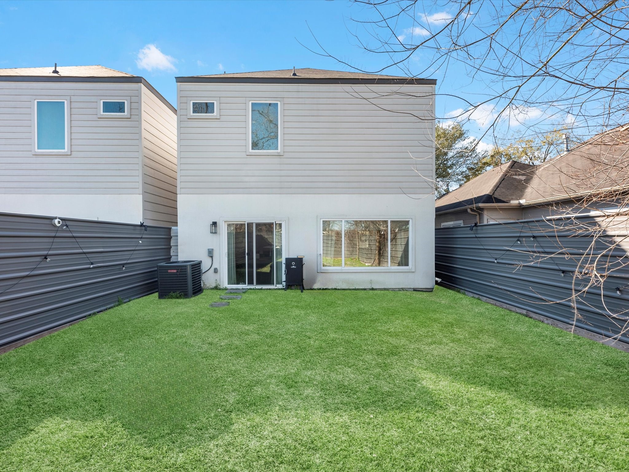 2222 Wavell Street Houston, TX 77088 - Photo 23 of 24 a view of a house with a yard