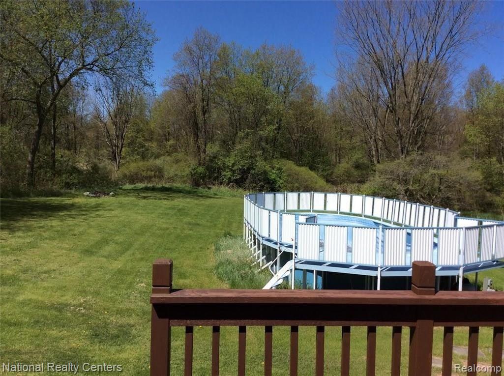 8151 Eagle Road Davisburg, MI 48350 - Photo 25 of 77 pool woods.jpg