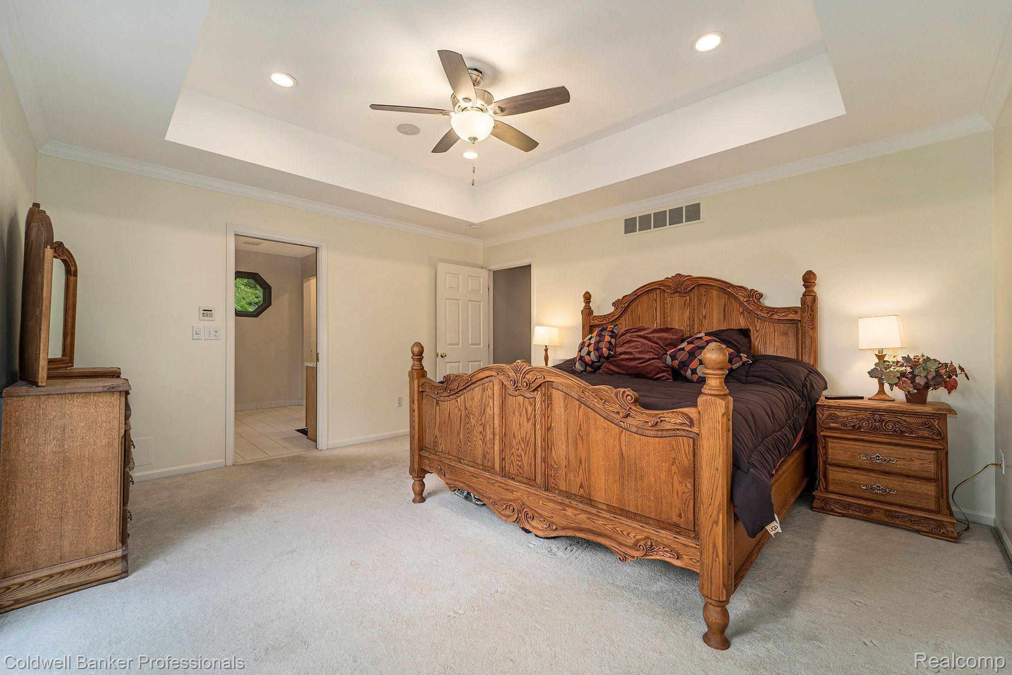 10249 Silver Lake Road Brighton, MI 48116 - Photo 21 of 34 Primary Bedroom with Tray Ceiling