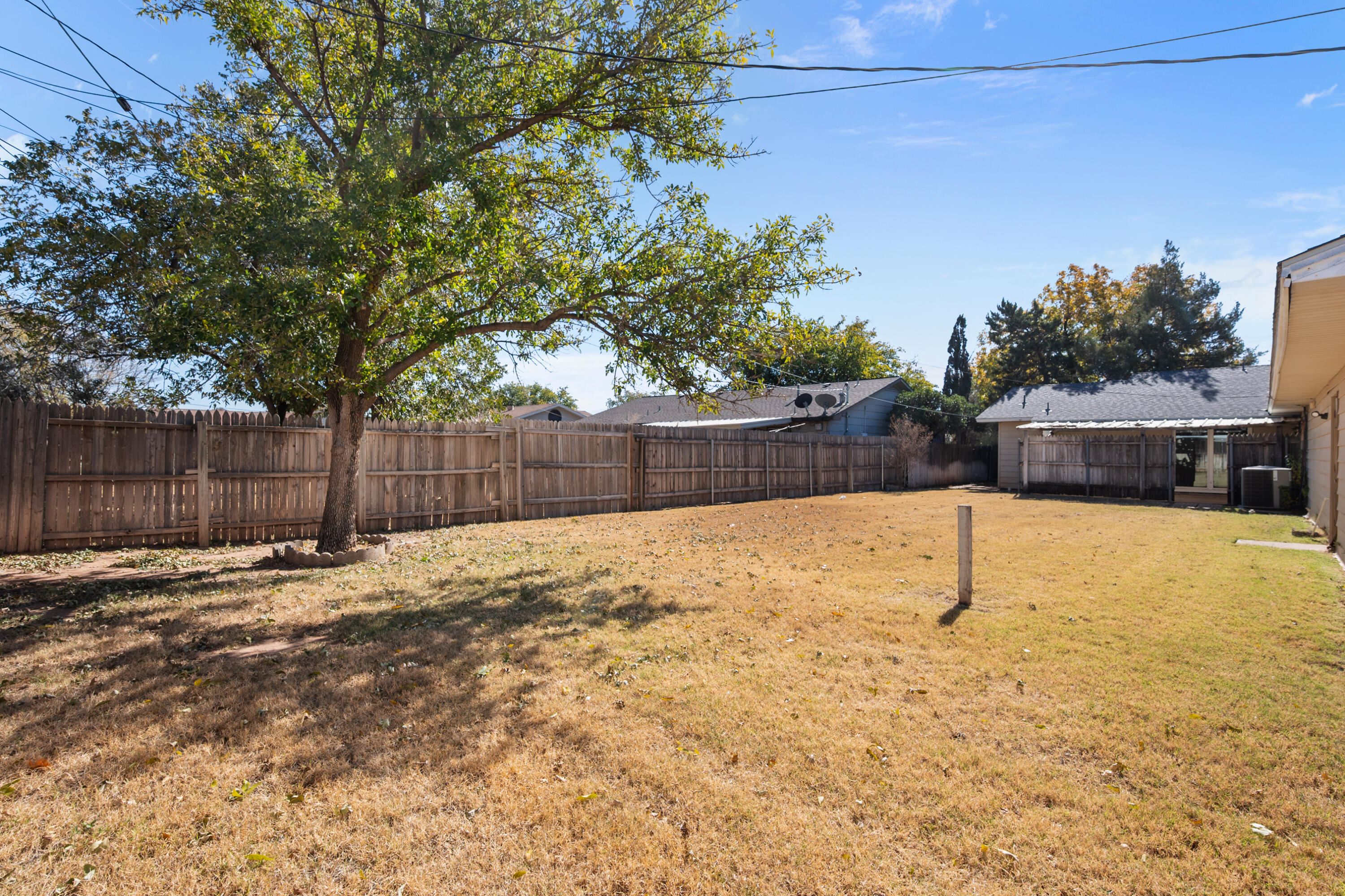 5440 48th Street Lubbock, TX 79414 - Photo 25 of 28 a view of a backyard