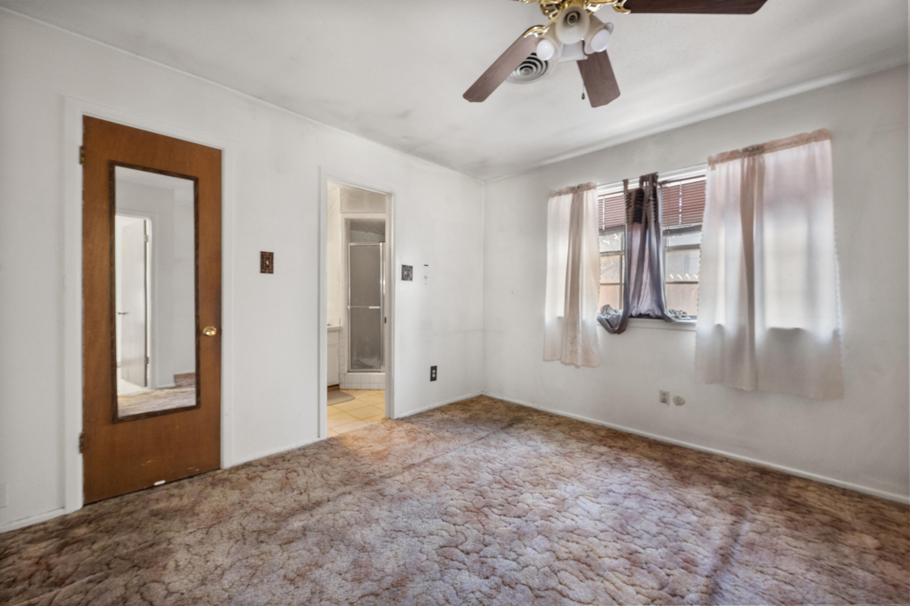5440 48th Street Lubbock, TX 79414 - Photo 26 of 28 a view of an empty room with a window