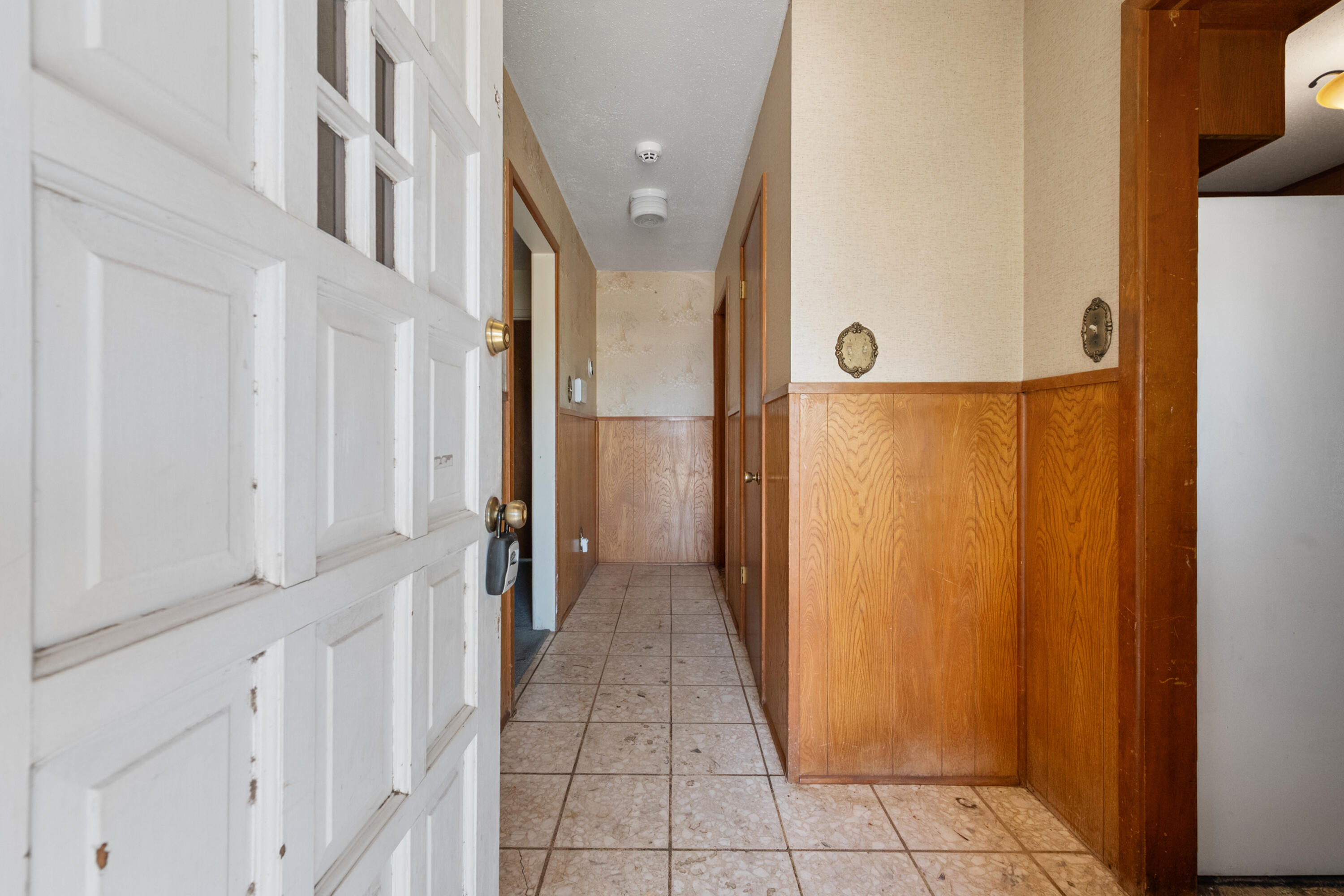 5440 48th Street Lubbock, TX 79414 - Photo 5 of 28 a view of a hallway with a white door