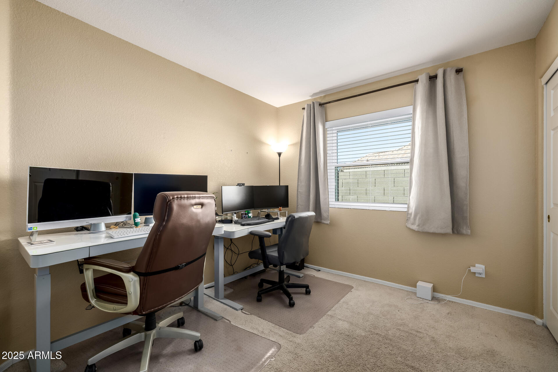 1675 East Robin Lane Gilbert, AZ 85296 - Photo 23 of 29 a view of a workspace with furniture and a window