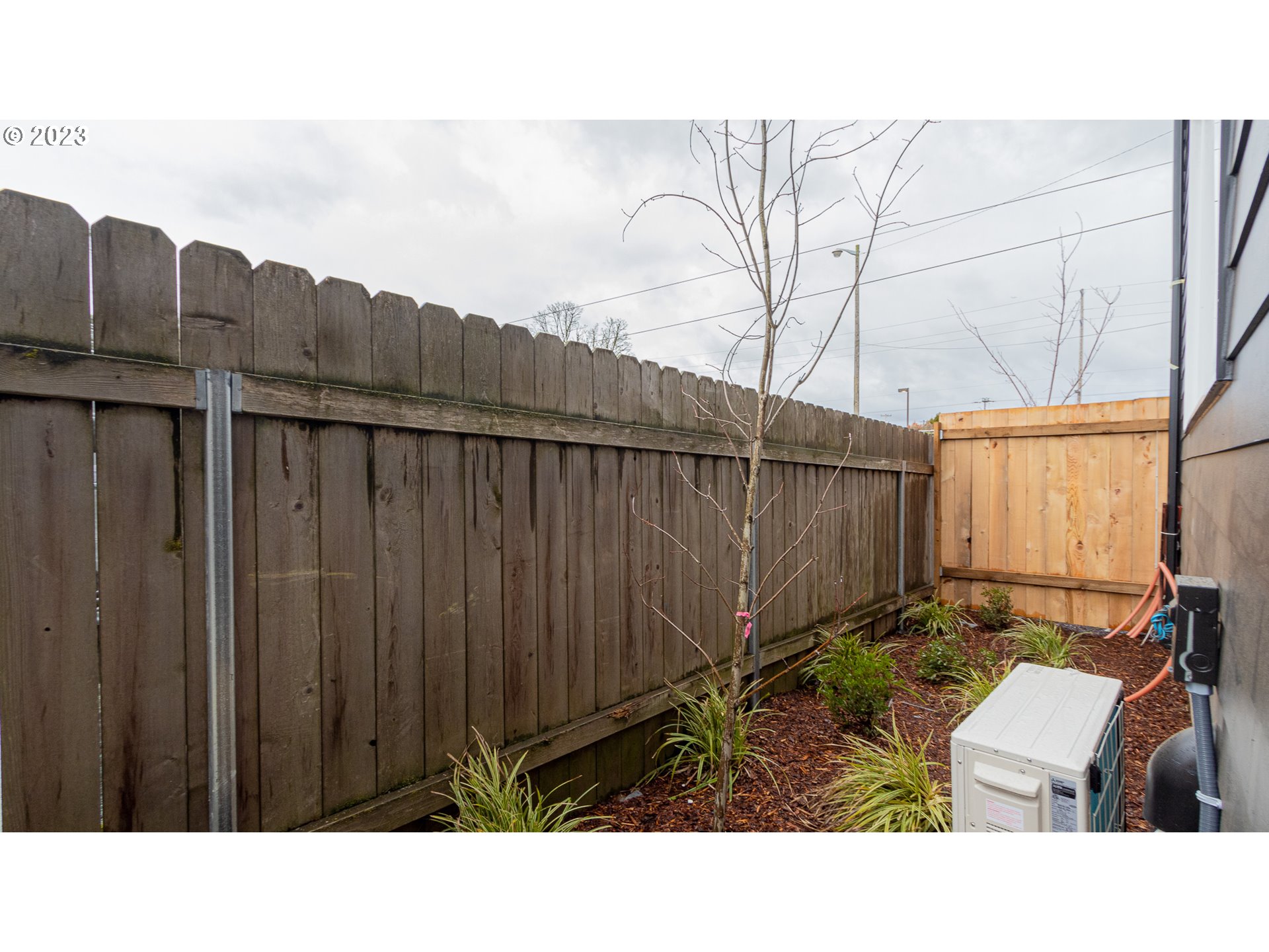 12063 Southeast Oak Street Portland, OR 97216 - Photo 11 of 11 a black and white photo of a house