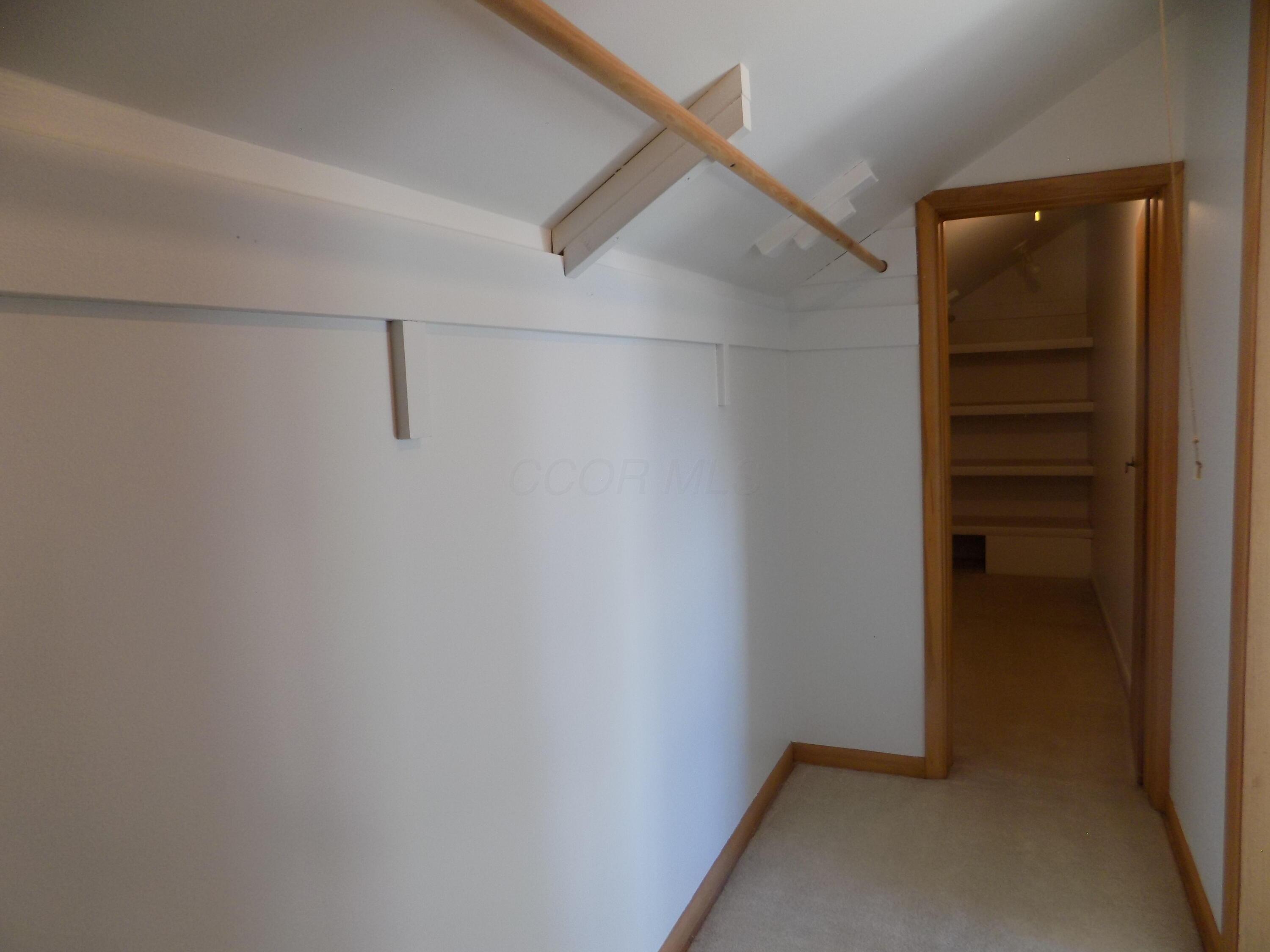 1743 Ardleigh Road Columbus, OH 43221 - Photo 20 of 29 The double closet continues on into another huge storage space.