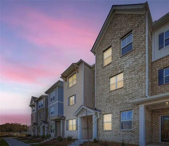 a front view of a multi story residential apartment building