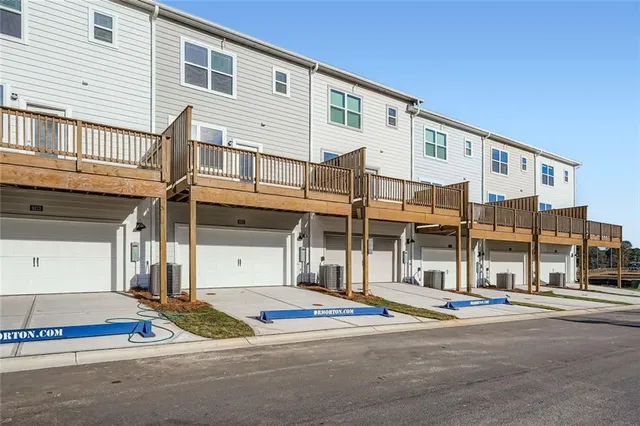a view of a building with a street