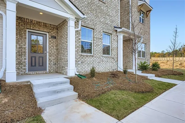 a front view of a house with entertaining space