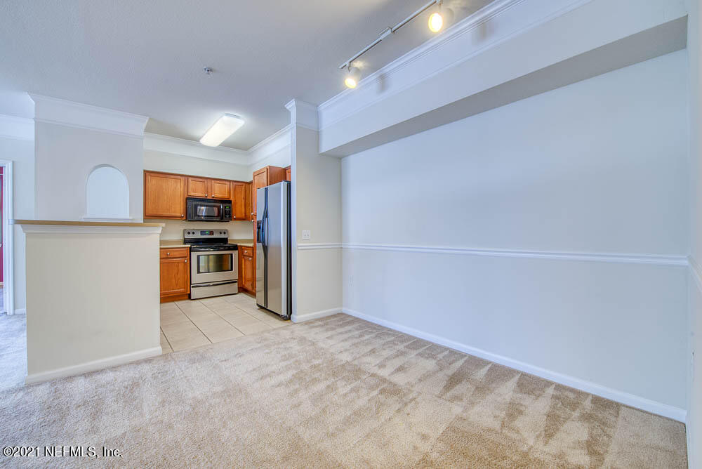 8550 Touchton Road, Unit 721 Jacksonville, FL 32216 - Photo 5 of 24 Kitchen and Dining Area