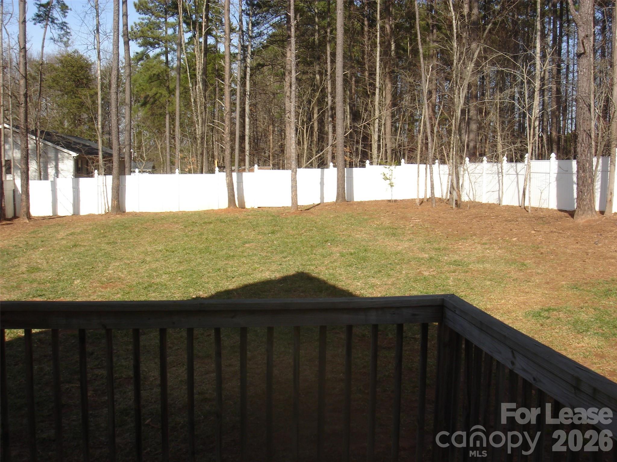 208 Chuckwood Road Mooresville, NC 28117 - Photo 15 of 15 a view of swimming pool with wooden fence