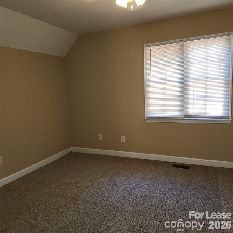 208 Chuckwood Road Mooresville, NC 28117 - Photo 9 of 15 an empty room with a window