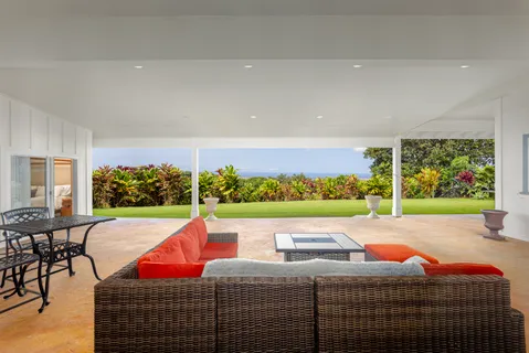 a room with furniture and a flat screen tv
