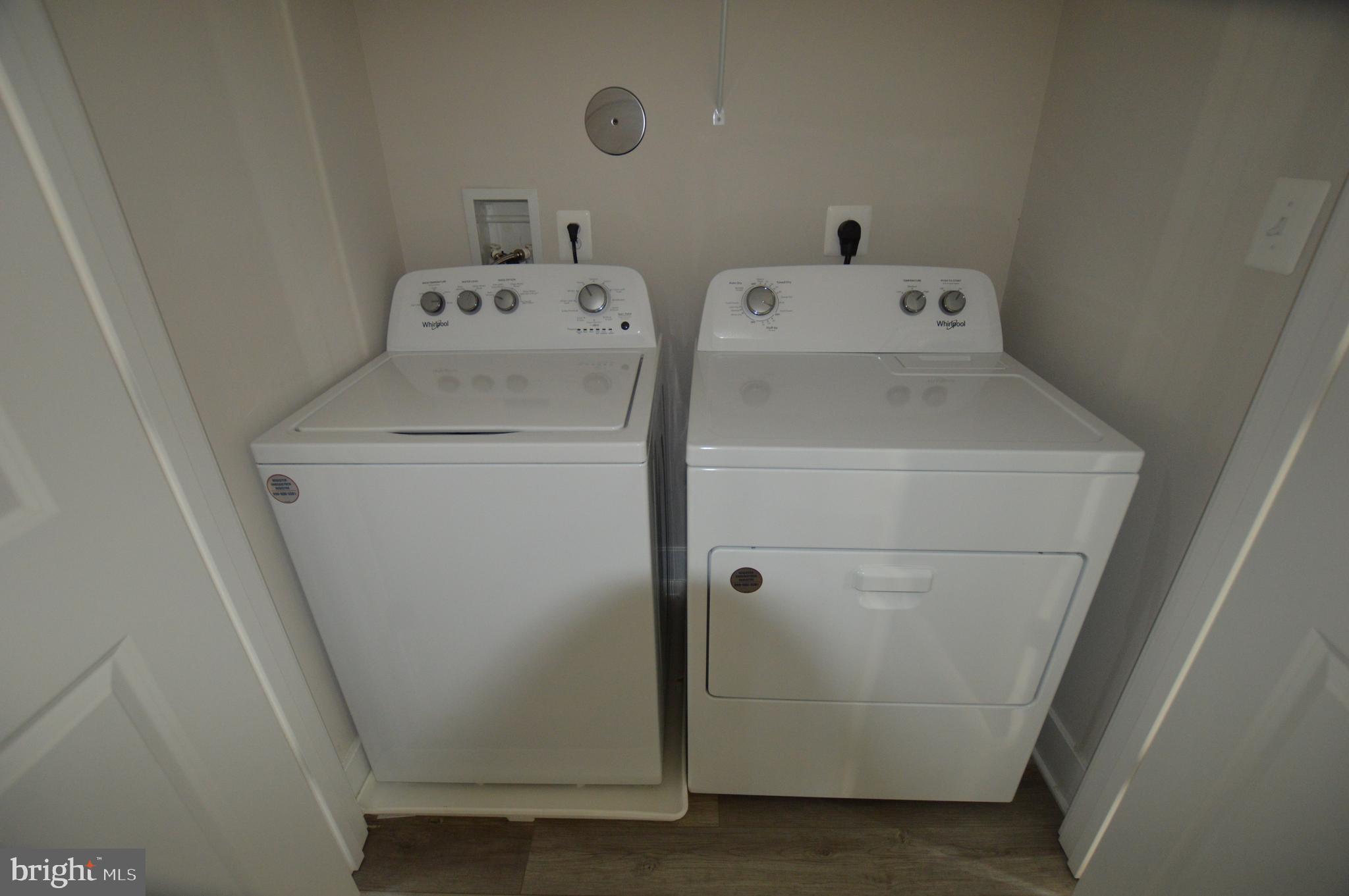 7927 Wormans Mill Road Frederick, MD 21701 - Photo 14 of 17 a utility room with dryer and washer