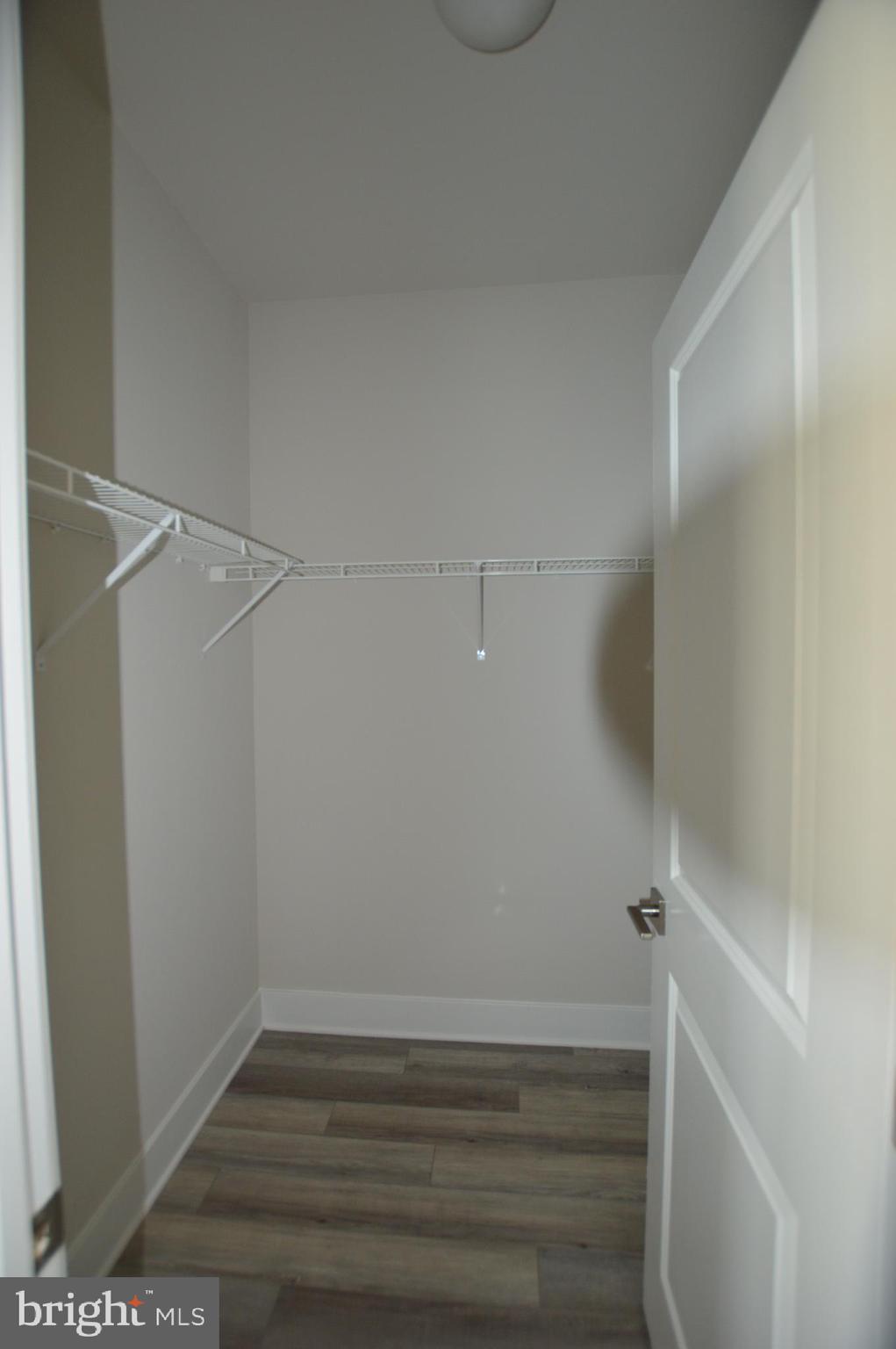 7927 Wormans Mill Road Frederick, MD 21701 - Photo 10 of 17 a view of an empty walk in closet
