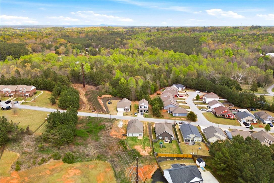245 Maple Grove Road Seneca, SC 29678 - Photo 39 of 40 This elevated view captures a serene residential neighborhood nestled among lush woodlands.