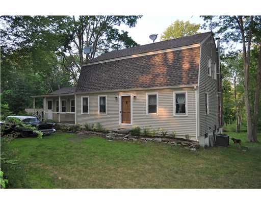 12 Burgess Road Foster, RI 02825 - Photo 1 of 13 Exterior Front. Charming home situated on Burgess Road in Foster featuring a large deck, great room, hot tub room and a bedroom on the first floor all situated on a 4 1/2 acre parcel with an oversized garage, horse stall and a carport.