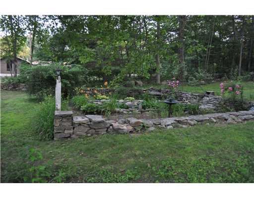 12 Burgess Road Foster, RI 02825 - Photo 12 of 13 Yard/Garden. Fish pond with waterfall.