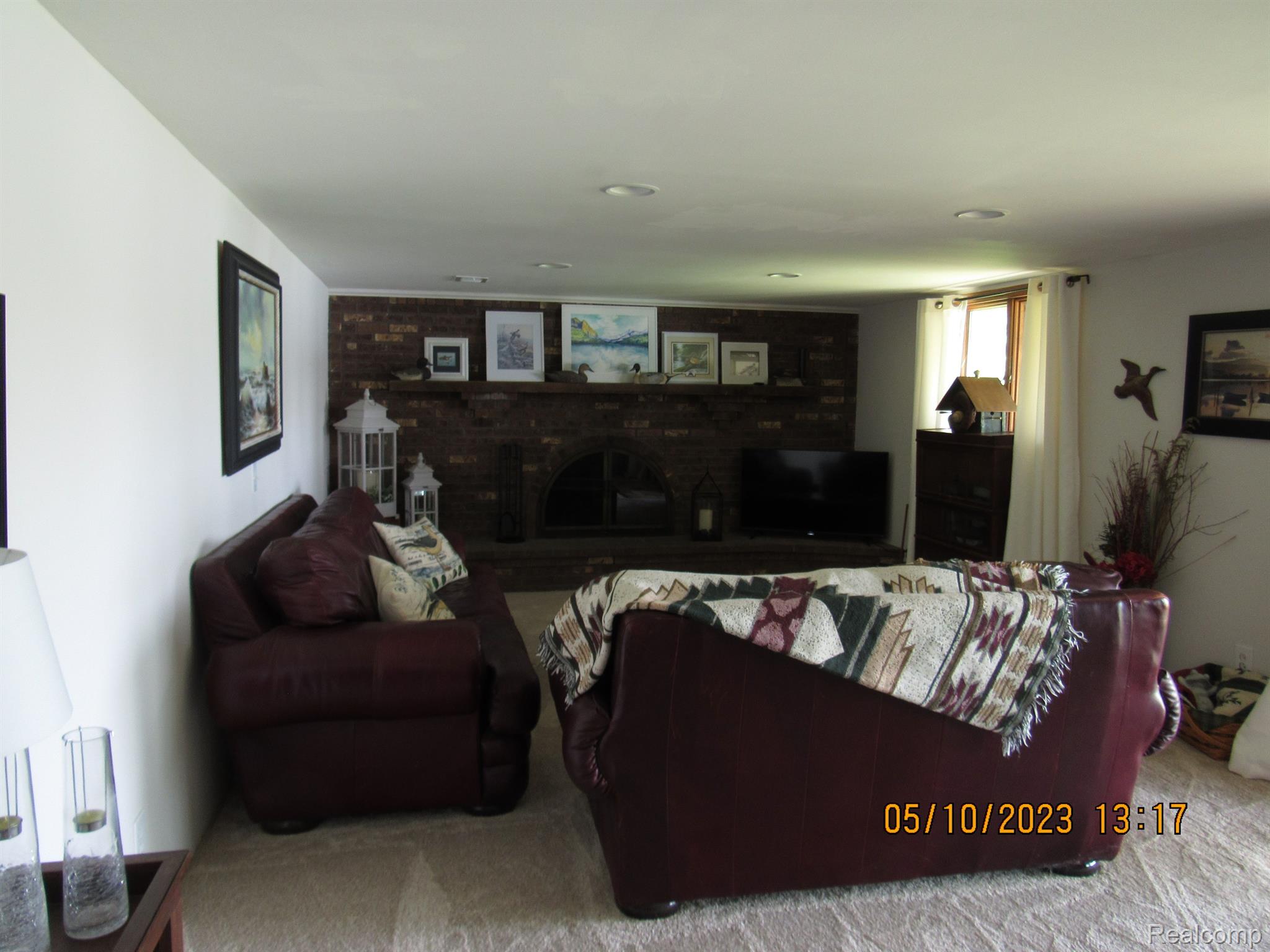 3383 East Rolston Road Fenton, MI 48430 - Photo 33 of 53 Firelit Family Room in Lower Level Walkout