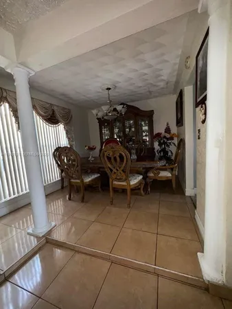 a view of a livingroom with furniture and toys