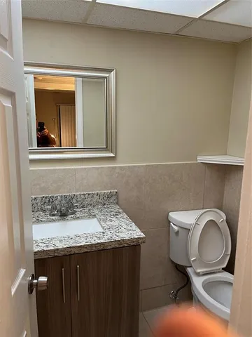 a bathroom with a sink and a toilet