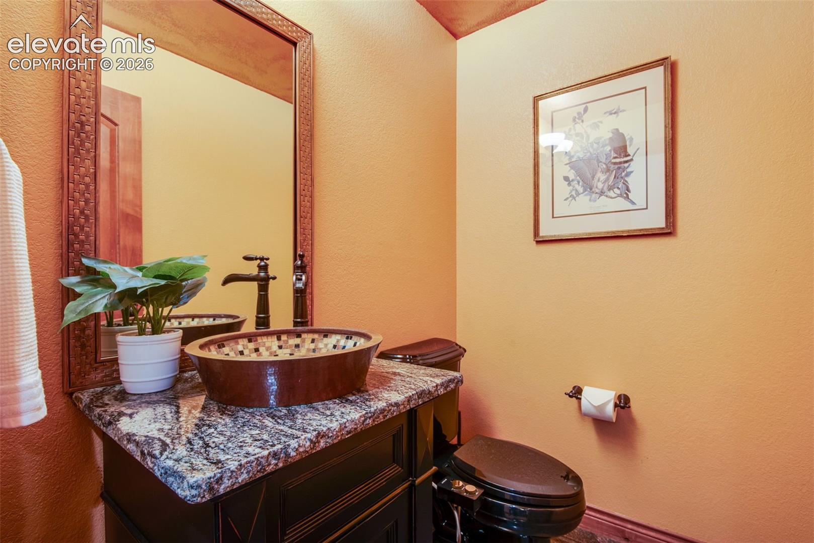 16075 Winding Trail Road Colorado Springs, CO 80908 - Photo 28 of 49 Powder bath on main level