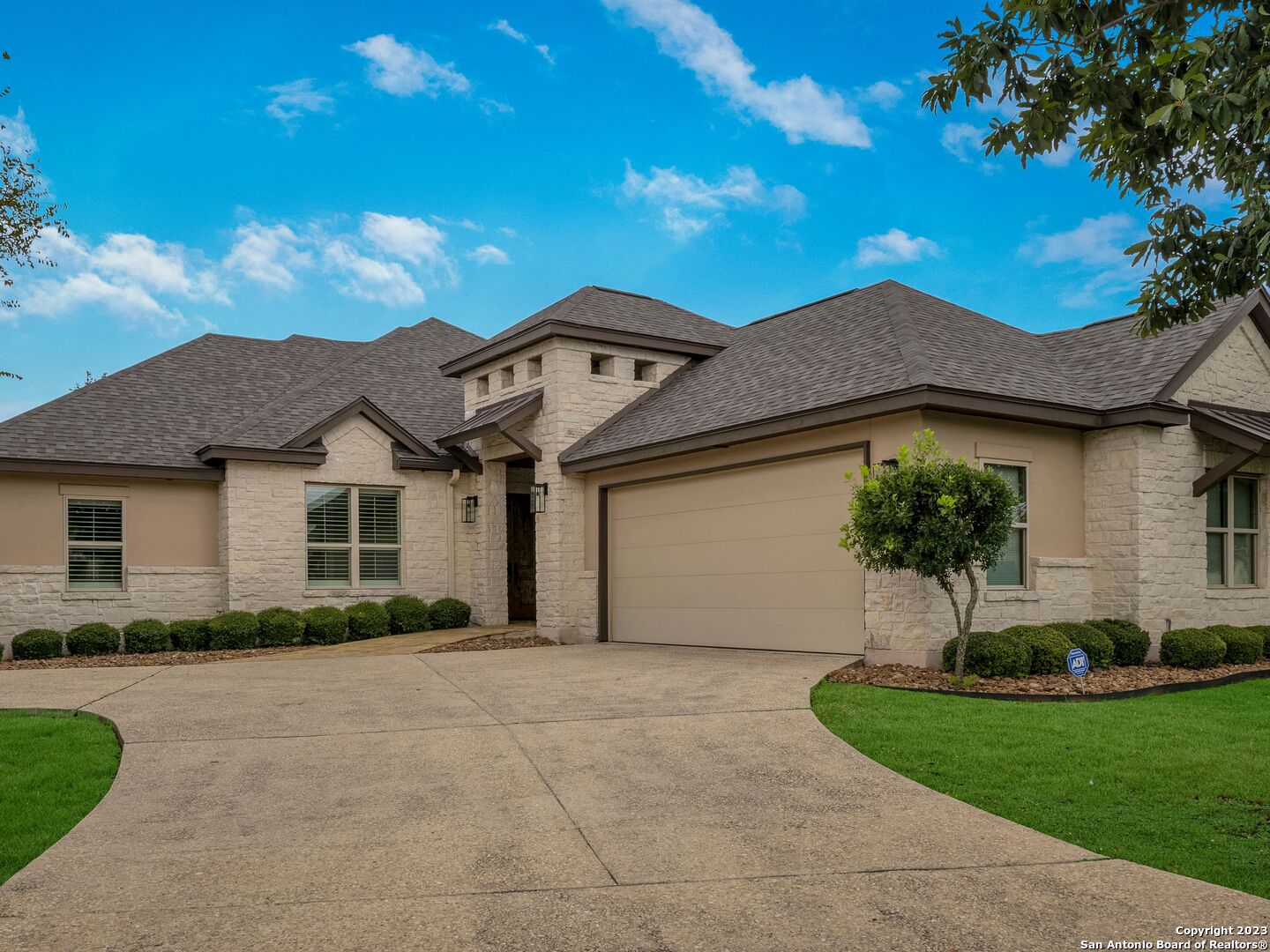 30007 Cibolo Path Fair Oaks Ranch, TX 78015 - Photo 1 of 1 a front view of a house with a garden and plants