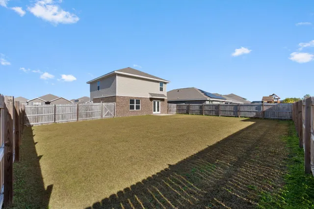 a view of a house with roof deck