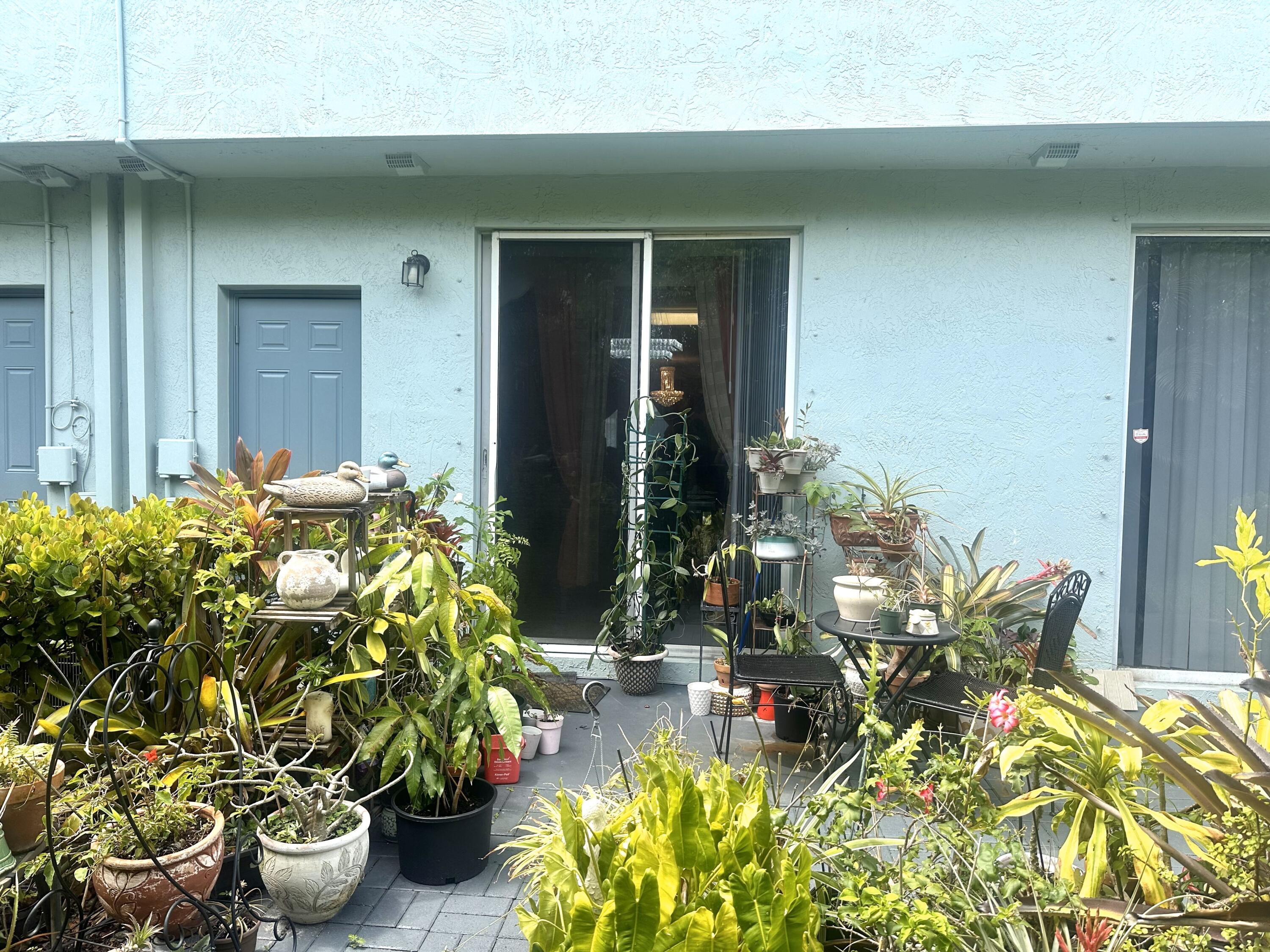 1938 Alamanda Way Riviera Beach, FL 33404 - Photo 18 of 18 Alamanda patio