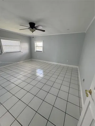 a view of balcony with wooden floor