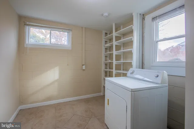 a view of storage room with washer and dryer