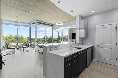 a kitchen with a stove and a microwave